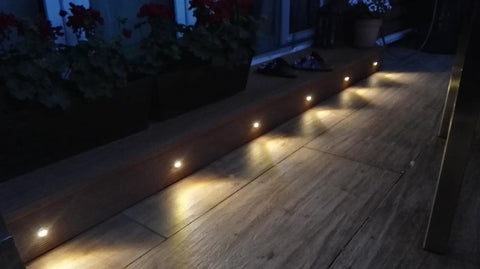 Aluminum Recessed LED Lights Kit 16 Pack 1.02 Inch 26 Millimeter Outdoor Deck Stair Lights 12V Low Voltage Waterproof Landscape Lighting 3000K Warm White Built Tough Weatherproof For Wall Deck Steps Walkway Driveway Backyard illuminating wooden outdoor steps at night