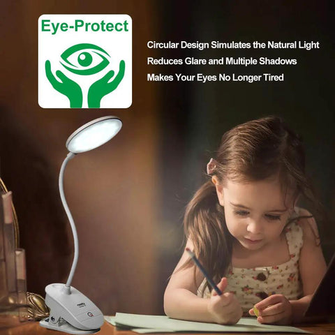 Clip On Bedside Reading Lamp With USB Rechargeable Battery, 18 LED Eye Friendly Light used by child for cozy illumination.