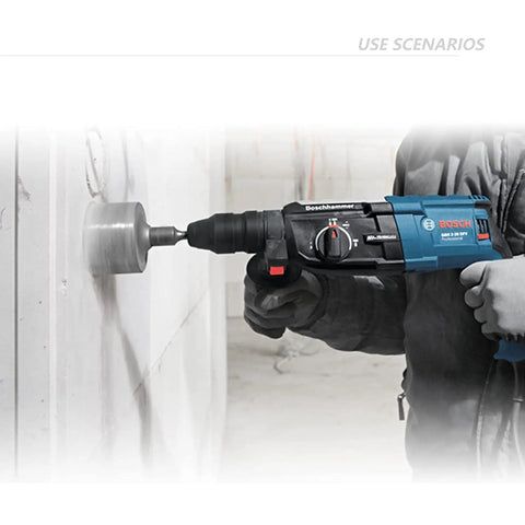 Worker using Beefed Up 15 Piece Concrete Hole Saw Kit With SDS Plus Shank on wall, showing 40mm hole size application.
