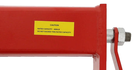 Close-up of caution label on Heavy Duty 2 Ton Load Leveler for Engine Hoist with 4000lb rated capacity.