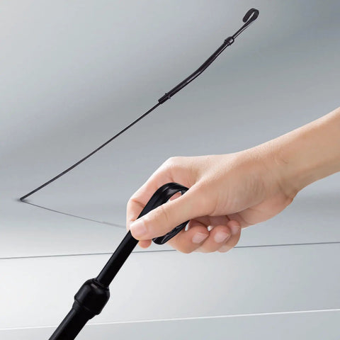 Flexible Oil Dipstick For Chevy Small Block V8 Engines 265 283 305 327 350 383 400, held by hand, black stainless steel