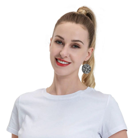 Black And White Grid Print Dangle Earrings For Women, Hella Lightweight Faux PVC Leather Look With Secure Silver Plated Hooks worn by a woman.