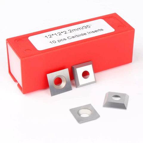 Straight Up 12X12X2.2Mm Square Corner Tungsten Carbide Turning Inserts with three sharp edges and box for storage.