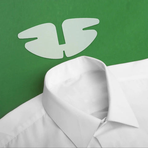 50 Piece Pvc Butterfly Collar Stays Double Layer Shirt Inserts to Keep Your Daily Fits Fresh And Sharp All Day Long laid on a white shirt collar.