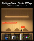 Smart lighting controlled by app, voice, or remote; focus on sleek, modern room with ambient light above table.