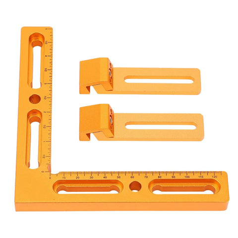 Dead On Precision Cnc Workpiece Positioning Fixture With T Slot Perforated Table Vise Clamps showing orange aluminum square and clamps