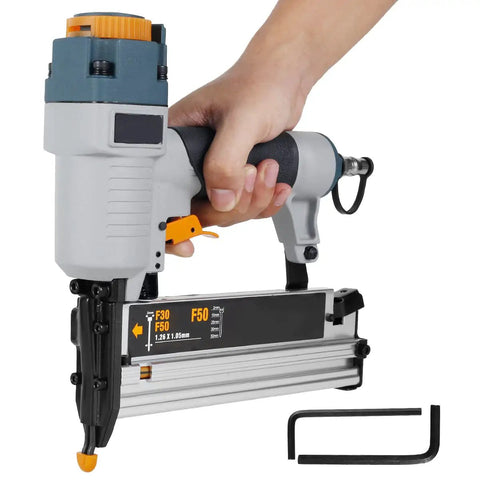 Straight Shooting Pro Level Heavy Duty Pneumatic Air Nailer For Carpentry And Fences With Adjustable Depth Control and Ergonomic Handle, hand holding nailer with fasteners.