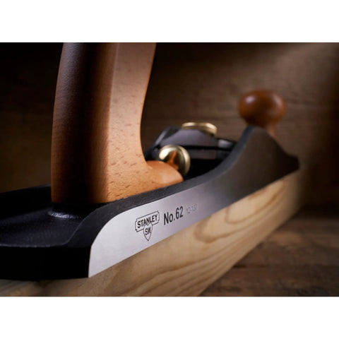 Close-up of Low Angle Jack Plane, Sweetheart No 64 Style, Old School Pro Hand Tool with ductile iron and wooden handle on wood surface.