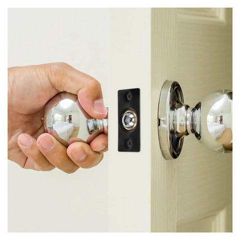 Hand grasping a shiny doorknob near a sleek stainless steel ball catch for door tops 12 set super adjustable spring hidden latch mechanism.