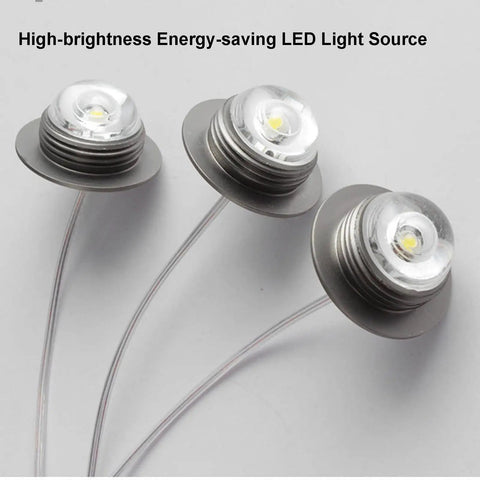 Lit Modern LED Glass Ball Pendant Light Fixture showing three LED bulbs with chrome finish, 3 light cluster, 110-240V.
