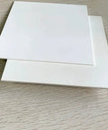 Two Boron Nitride Ceramic Square Sheets BN 99 Percent for Heat Sink and Experimental Use 7mm by 100mm by 100mm stacked on table