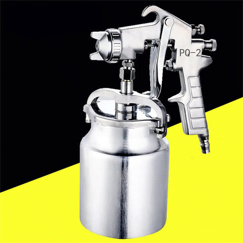 Hardcore Pro Level Pneumatic Spray Gun With Slick Adjustable Valve And Killer Stainless Steel Nozzle For Smooth Auto Paint Jobs Up To 1000 Ml Capacity Tight Antiskid Grip Saves Dough On Quick Body Work Details - close up of stainless steel nozzle and spray gun body.