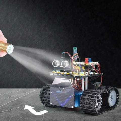 Dope Mini Smart Tank Robot Kit Version 3 For STEM Fans Programmable Car Kit Compatible With Arduino And Mixly Featuring Line Tracking Fire Extinguishing Light Following And More Easy Assembly For School And Home, front view with sensors and tracks