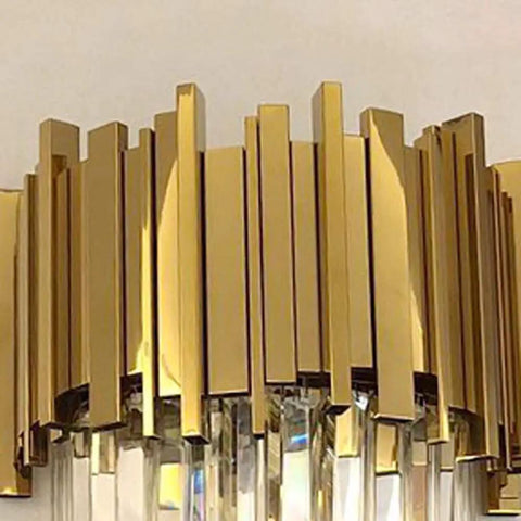 Sleek Led Wall Sconce Textured Crystal Glass Rod Shade Brushed Steel Frame close-up view of gold frame design