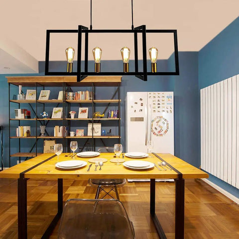 Four Light Kitchen Island Pendant Light Modern Industrial Chandelier In Matte Black With Antique Brass Finish over dining table