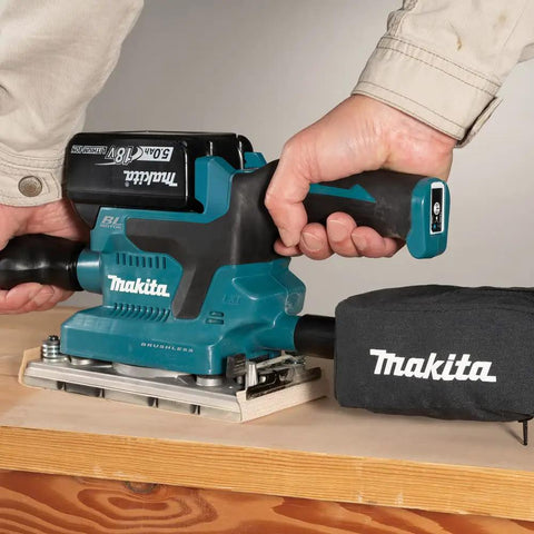 Badass Brushless Orbital Finishing Sander With Push Button Three Stage Electronic Speed And High Orbit Rate For Slick Wood Smoothing And Fast Prep Work Tool Only in use on wood panel.