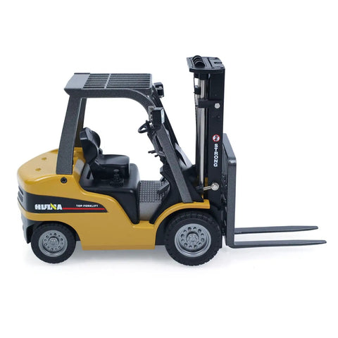 Mini Warehouse RC Forklift Model 9925 With Realistic Light And Sound Effects Precise Steering Lift Lower Function Plus Remote Control Operation For Indoor Play side view with operational forks.