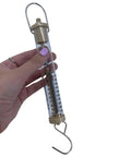 Dual Scale Newton Force Meter Spring Scale With 10N Max Capacity And 1 Kilogram Reading, Pro Grade Precision Lab Ready Educational Tool With Easy Twist Zero Calibration For Quick, Accurate Measurements In Class Or Lab, clear acrylic spring scale held by hand