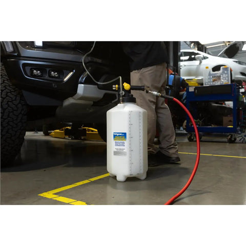 Fluid Extractor Dispenser For Evacuating And Refilling Reservoirs, Topping Off And Bleeding Hydraulic Brake And Clutch Systems, 5.3 Gallon Capacity, 120 PSI, Vacuum Or Positive Pressure, Compressed Air Ready, Pro Grade Heavy Duty shown in use