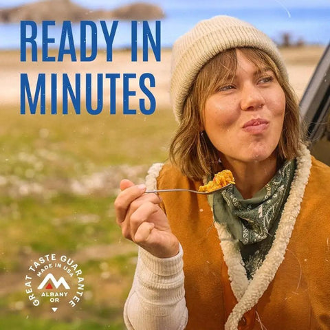 Person enjoying Freeze Dried Rice And Chicken With Carrots Celery And Red Peppers Emergency Canned Meal Pack For Camping And Survival Gluten Free Dairy Free