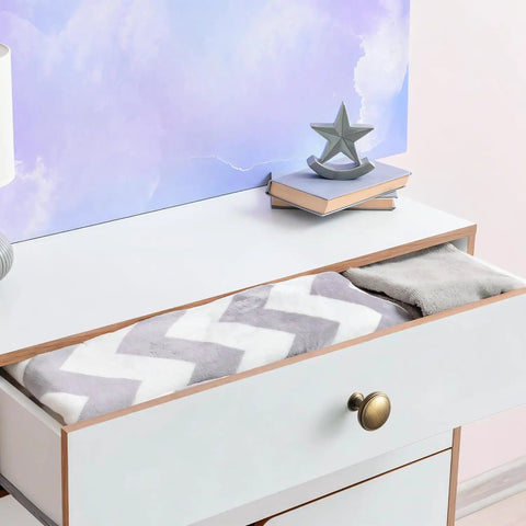 Brushed Bronze Cabinet Knobs 6 Pack Set For Kitchen Cabinets And Dressers shown on a white drawer in bedroom setting