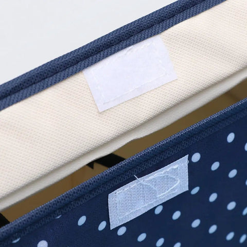Close-up of Grid Multi Compartment Underwear Storage Box Oxford Cloth with polka dots, showing fabric layers and velcro.