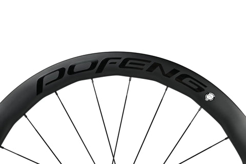 Close-up of Carbon Disc Wheelset 50C Tubeless Center Lock With Front 12x100 And Rear 12x142 Thru Axles Black Finish, rim view