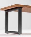 Heavy Duty Metal Table Legs With Adjustable Feet And Floor Protection 28 Inch High 24 Inch Wide Industrial Rustic Desk Or Table Legs Black Set Of 2 Supports Up To 800 Lb, installed under a wooden tabletop.
