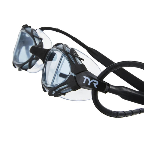Crush The Daily Lap Grind With These Nest Frame Swim Goggles Locked In With Smoke Tint Wide Peripheral Vision And Tough Unibody Construction For Peak Pool Visibility. Close-up of black frame swim goggles with anti-fog lenses.