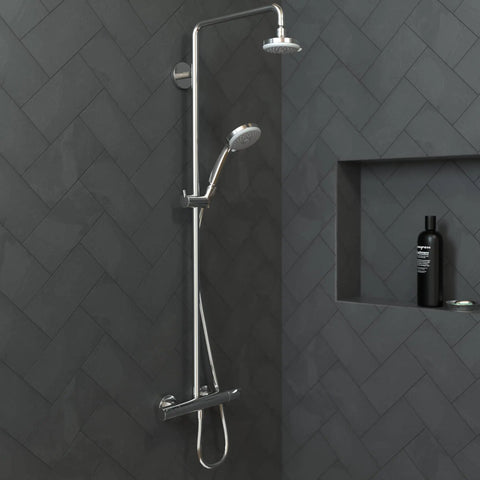 3 Jet Handheld Shower Head With 2.5 GPM Flow, Croma Collection in a modern bathroom, wall-mounted near dark tile