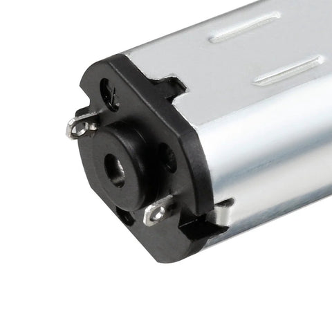 DC micro gear motor with metal body and black end cap, side terminal lugs visible