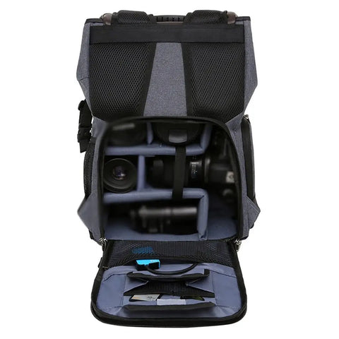 Waterproof DSLR Camera Backpack with large capacity open, showing organized compartments for cameras and accessories.