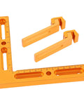 No Sweat Cnc Workpiece Positioning Fixture Kit For T Slot Tables, orange aluminum square with clamping arms for precise setup.