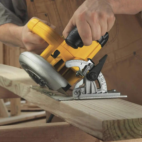 Lightweight 7-1/4 Inch Corded Circular Saw Featuring A Badass 15 Amp Motor With Snappy Electric Brake cutting through wooden plank.