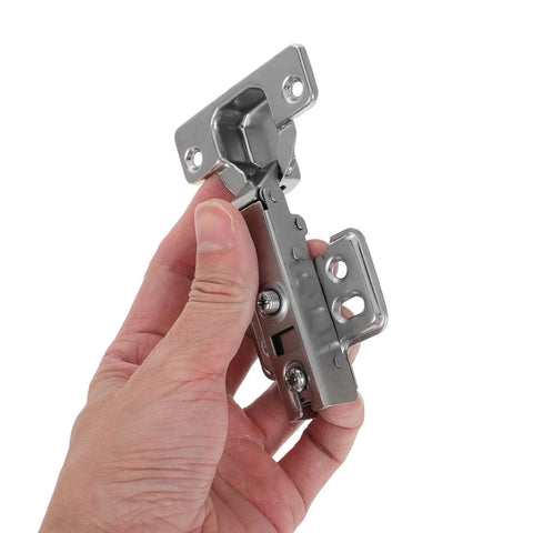 Hand holding Soft Closing Cabinet Door Hinges With Hydraulic Support 2 Pack Frameless Concealed Steel Hinges Modern Sleek Look