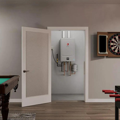Ikonic Rectgh SR11iN Tankless Gas Water Heater with recirculation installed in a utility room, compact and energy-smart design.