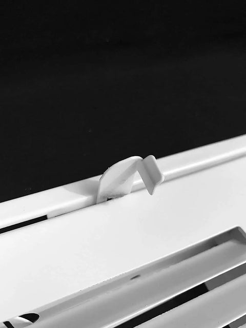 Close-up of latch on 12x12 Steel Return Air Grille With Removable Door For 1 Inch Filters White HVAC Vent Cover For Wall Or Ceiling