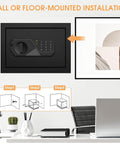 Heavy Duty Home Safe With Fireproof And Waterproof Protection Digital Security Safe With Key And Combo Lock Ideal For Storing Firearms Meds Documents Cash And Valuables In A 2.0 Cu Ft mounted on wall in office.