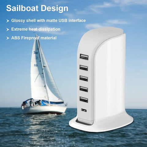 40W USB Charging Hub Workhorse with five ports and Type C 3A desktop wall charger tower next to a sailboat on the water