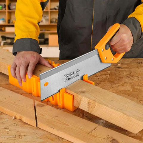 Person using Miter Box And Saw Set 14 Inch Back Saw With ABS Box For Woodworking Trim Molding And Carpentry Precision Angle Cuts 45 Degree And 90 Degree For Framing And Picture Frames Pro Grade to cut wood.