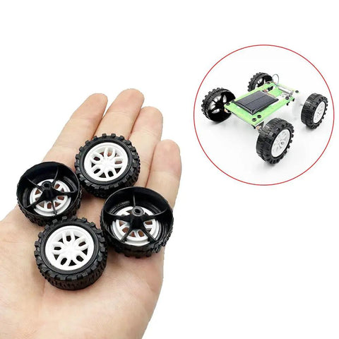 DIY Model Toy Car Wheel Set with 30 plastic wheels and 15 metal axles in hand and assembled RC car with 31mm wheels, 11mm thick