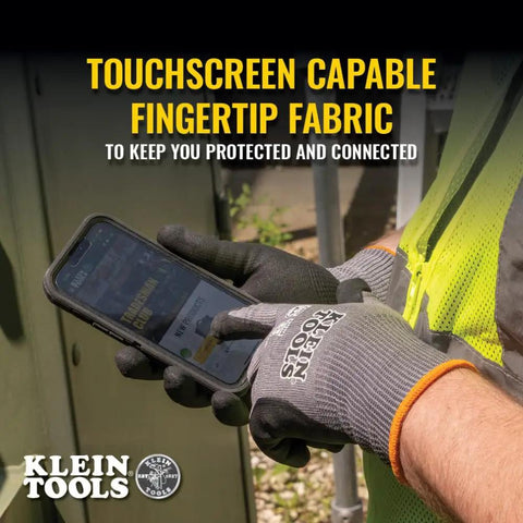Person using touchscreen phone wearing Cut Resistant Work Gloves With Nitrile Coated Grip, HPPE Fabric, XL Size, 2 Pack