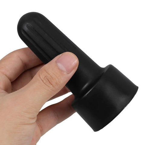 Hand holding a black plastic wrench from the Slick Eight Piece Light Socket Ring Remover Plastic Wrench Set G9 E14 E26 E27 Bulb Base Adapter.