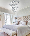 LED Crystal Chandelier With 4 Ring Design, Modern Stainless Steel Pendant Light in bedroom with neutral decor