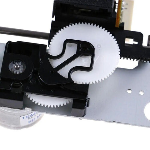 Close-up of Complete 16 Pin CD Player Mechanism Replacement For SF P101N Version S gears and sled motor assembly components.