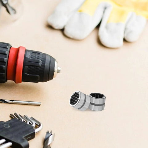 2 Piece Needle Roller Bearing Kit Fits Electric Hammer Drill And Angle Grinder Precision Steel Thrust Bearings Heavy Duty Rock Solid Industrial Grade Replacement Parts For Drills Cutters Badass Performance Upgrades, two silver bearings beside drill bits
