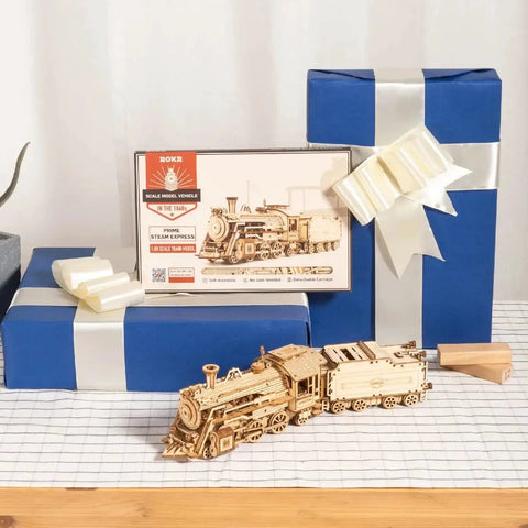 Wooden Model Car Kit For Adults A Fun Hands On 3D Puzzle Build That Doubles As Brain Teaser Desk Decor And DIY Hobby Gift With Step By Step Instructions Durable Pieces Realistic Details And STEM Friendly Play next to blue gift boxes