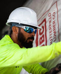 Worker wearing Khor G2 Polarized Wraparound Safety Glasses With Vapor Shield Go To Anti Fog Anti Scratch Non Slip Grip UV 400 Protection