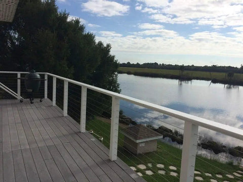 Scenic deck view with DIY Cable Railing Tension Ends For One Eighth Inch Stainless Steel Cable, wooden posts overlooking water