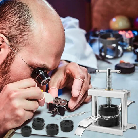 Watch Press Tool Set With 18 Molds Case Closer Crystal Press And Battery Replacement Repair Kit in use by a watch repair professional